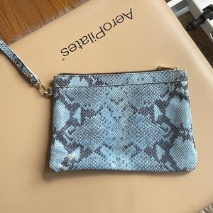 LAURA DIMAGGIO clutch purse